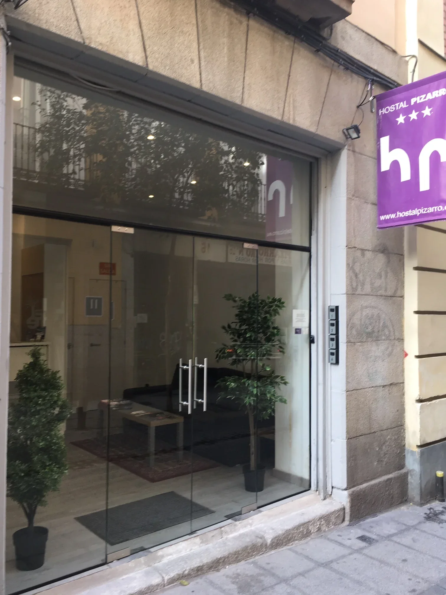 Reception entrance with floor-to-ceiling glass facade