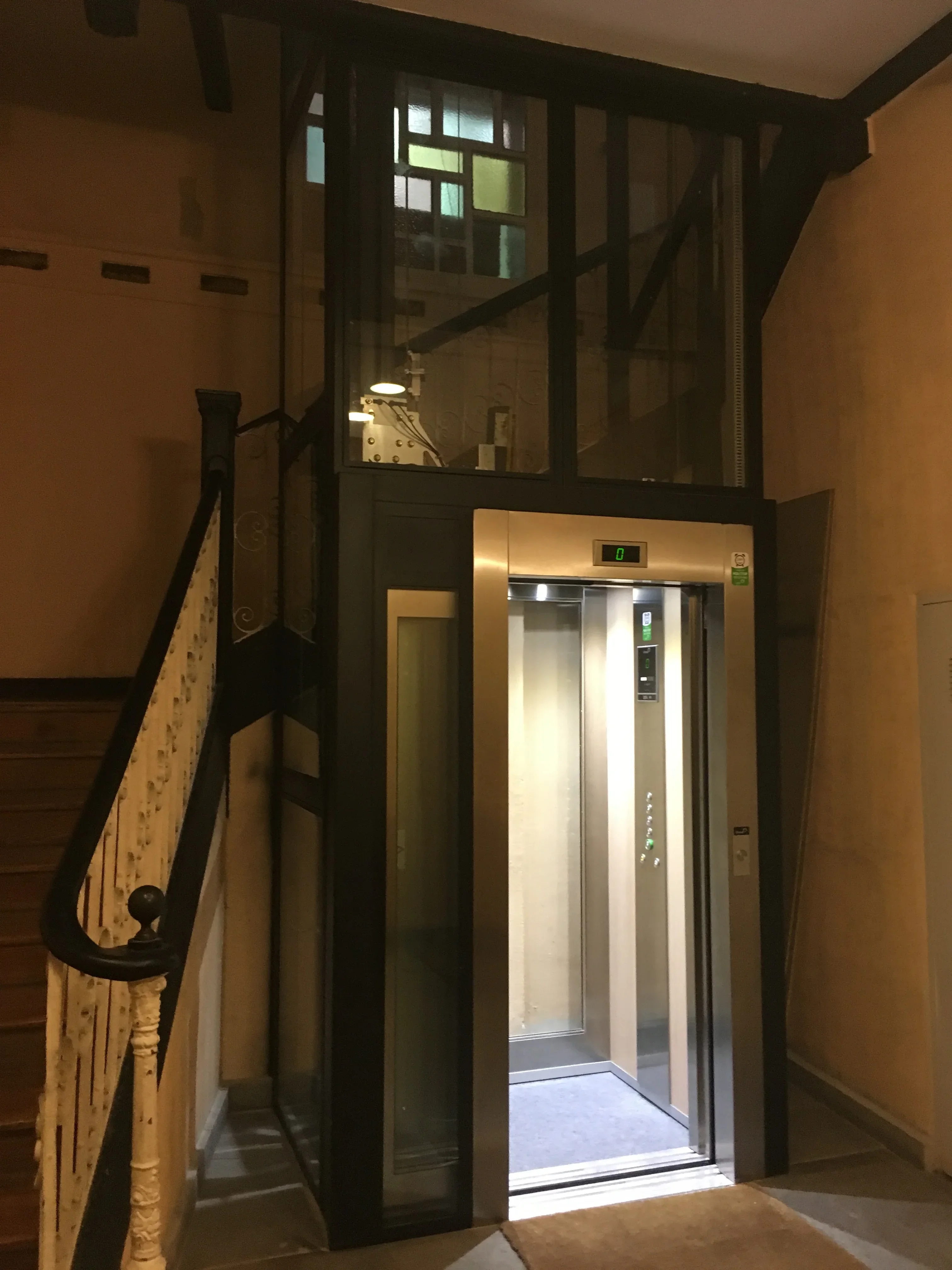Compact contemporary elevator in heritage building
